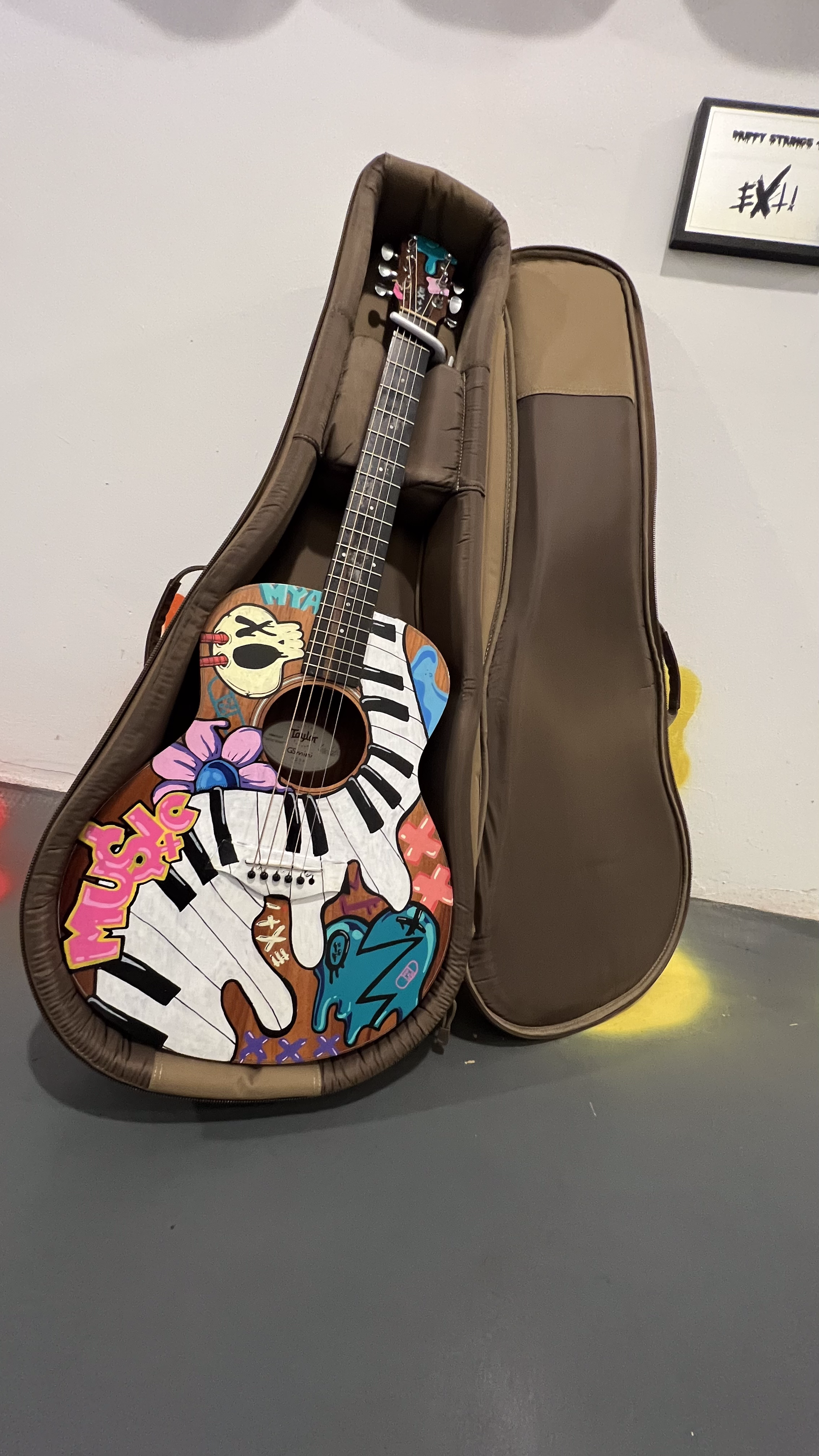 MYA front man Agustin Bernasconi, requested EXTi to deck his Taylor acoustic guitar wi