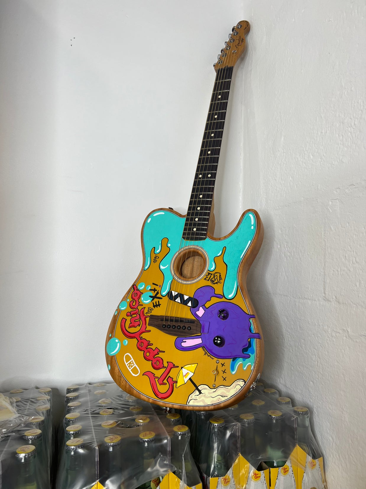Topo Chico commissioned a special Fender guitar to EXTi, to release it during Miami Art Week 2022, and prepare to kick off a 2023 tour around the USA of the unique piece.