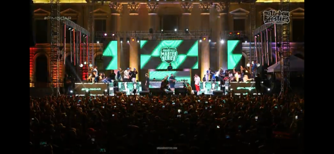“Freestyle Master Series” had EXTi write a theme song for their 1st round live show at El Salvador, and design the outfit for his host and mc “Misionero”, to it.